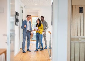 Agent Showing Client Couple Home Interior Gettyimages 1448623832 1300w 867h.jpg